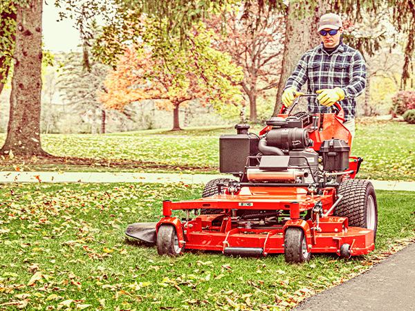 Man using a Snapper Pro Walk Behind Mower