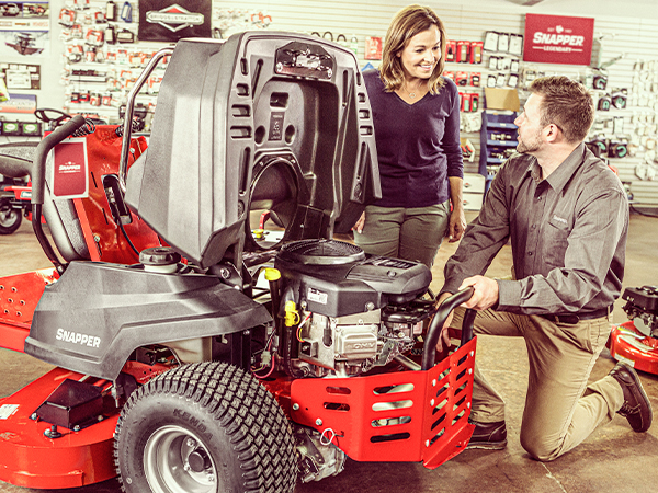 Dealer showing a customer a product